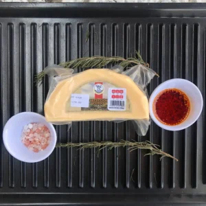 Empaque sellado de queso manchego natural marca VAI, ideal para fundir en carnes asadas, disponible en Regio Beef CDMX.